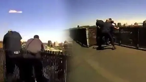 ชมคลิปวินาทีชีวิต! ตร.มะกัน คว้าสาวเมาปลิ้น คิดโดดตึกฆ่าตัวตายได้สำเร็จ