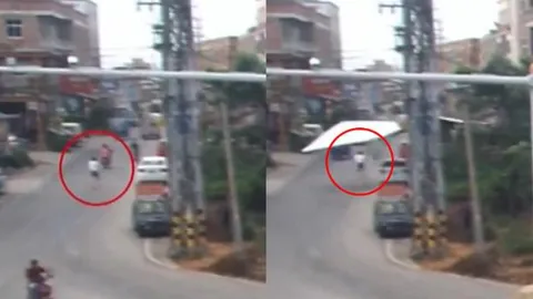 คุณพระช่วย! ชมคลิป หนุ่มรอดตายหวิว ป้ายโฆษณายักษ์ปลิวหล่นเฉียดร่างหวุดหวิด