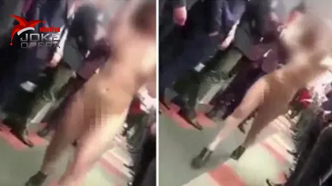 สาวแก้ผ้าเดินโชว์ปลุกขวัญ