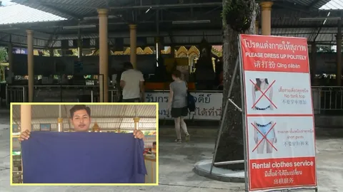 วัดดังกระบี่ แจกผ้าคลุมฟรีให้นักท่องเที่ยวสุภาพสตรี แต่งสั้น สายเดี่ยว