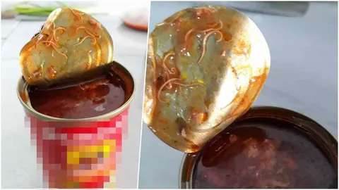 นี่มันตัวอะไร! สาวเจอเส้นขาวๆ ในปลาประป๋องยี่ห้อดัง ขดพันกันยั้วเยี้ย