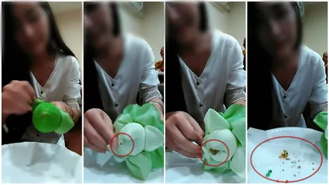 จริงหรือไม่? สาวอัดคลิป แกะกลีบดอกบัวเจอ 'พลอยพญานาค-พระธาตุหลากสี'