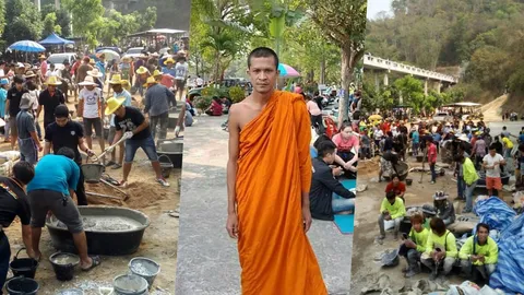 สาธุชนนับพัน หลั่งไหลช่วยเทปูนสร้างถนนวัดเขาตะแบก หวังแบ่งเบางานสงฆ์
