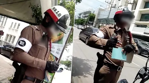 ซุ่มจับหมวกกันน็อก! โวยตำรวจกระโดดตัดหน้า ขู่พูดมากยิ่งเสียเงิน (คลิป)