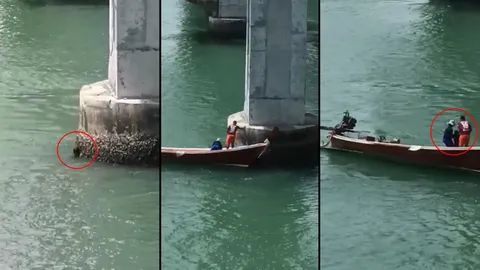 รุดช่วยหนุ่มลอยคอเกาะตอม่อสะพานสารสิน พบสายชาร์จแบตพันธนาการข้อมือ (คลิป)