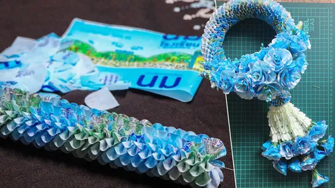 งานฝีมือ...ครูหนุ่มประดิษฐ์พวงมาลัยสวยงามจากถุงนมโรงเรียนขยะเหลือใช้