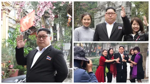 ผู้คนในกรุงฮานอยแห่ขอถ่ายรูปกับ คิม ไทยแลนด์ หลังตัวจริงเพิ่งมาถึง