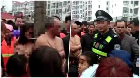 เมียแค้นมากผัวมีชู้ จับแก้ผ้าพร้อมกิ๊กสาว มัดติดต้นไม้ประจานกลางเมือง (คลิป)