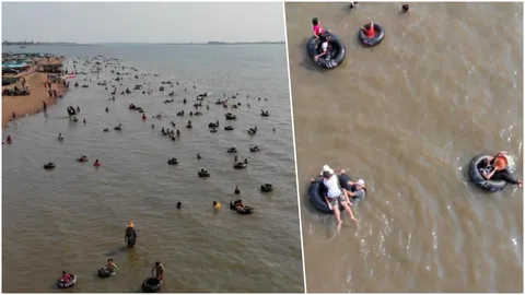 กาฬสินธุ์ร้อนทะลุ 41 องศาฯ คนแห่เที่ยวเขื่อนลำปาว เล่นน้ำแหลมโนนวิเศษ