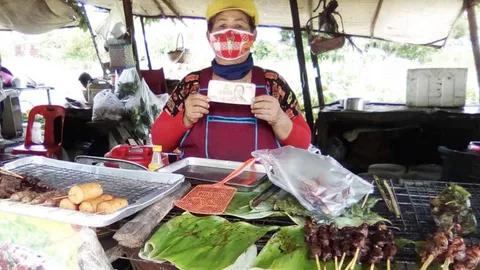 สาวใจร้าย ซื้อปลาดุกย่าง จ่ายแบงก์พันปลอมให้ป้า ยังรับเงินทอนไปอีก