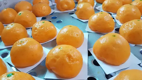 แม่ค้าไอเดียแจ่ม ทำซาลาเปาส้มรับสารทจีน ออเดอร์เพียบใช้ไหว้แทนส้มจริง