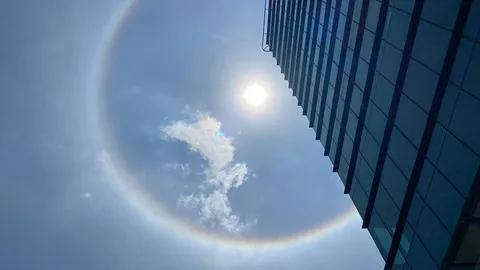 แห่แชร์ภาพ พระอาทิตย์ทรงกลด เส้นรอบวงสีรุ้ง ท่ามกลางอากาศร้อนจัด