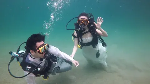 โควิดพ่นพิษ วิวาห์ใต้สมุทรตรังล่ม งดจัดงานในรอบ 25 ปี พบป่วยแล้ว 5 ราย