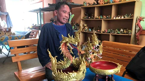 ปั้นพญานาคขี้เลื่อยสู้โควิด