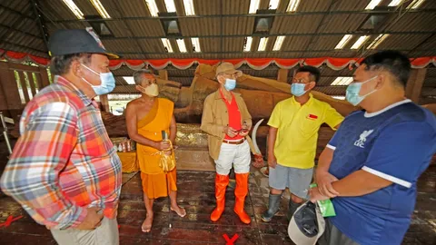 "สุวัจน์" เร่งช่วยพระนอน 1,300 ปี สูงเนิน จนพ้นวิกฤติน้ำท่วมแล้ว