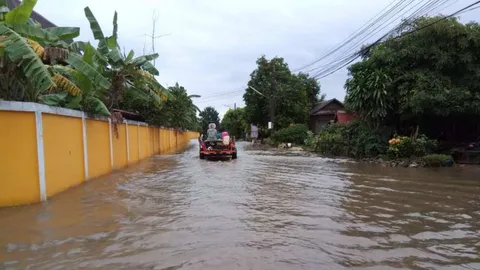 อ่างเก็บน้ำห้วยใหญ่ล้นความจุ ทะลักไหลเข้าท่วมหลายหมู่บ้านที่ อ.ไพศาลี