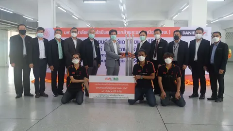 มจพ.มอบหุ่นยนต์ประดู่แดงฉายแสง UVC ให้กับบริษัท ดานิลี่ จำกัด
