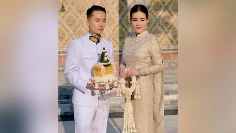 เดย์ ไทยเทเนี่ยม จูงมือแฟนสาวเข้ารับพระราชทานน้ำสังข์ มงคลชีวิตคู่