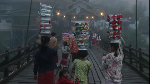 สั่งห้ามเด็กเทินหม้อ ถ่ายรูปกับนทท.บนสะพานมอญ ชี้เป็นเครื่องมือหากิน 