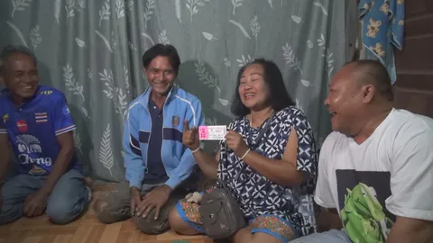 "2 ผัวเมียชาวอุดรฯ" สุดเฮง ถูกรางวัลที่ 1 รับโชคใหญ่ 12 ล้านบาท (คลิป)