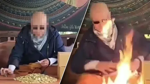 พระพ่นไฟปลุกเสกพระเครื่อง พลาดลามติดหน้าอก-ปาก (คลิป)