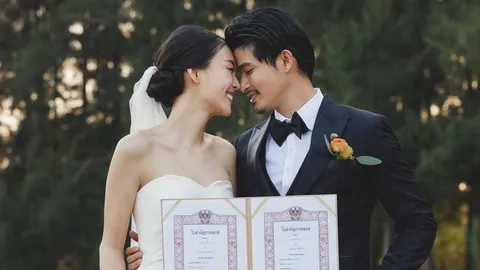 ฉลองคริสต์มาสด้วยข่าวดี "ตูมตาม-อาหลี" โพสต์ภาพชุดแต่งงานพร้อมทะเบียนสมรส