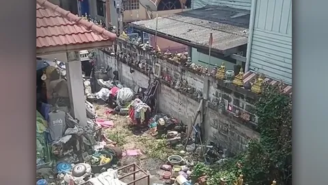 โซเชียลเสียงแตก หลังหนุ่มรีวิวของสะสมเพื่อนบ้าน เรียง "พระพุทธคุณ" เต็มกำแพงรั้ว