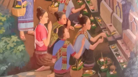 รู้จัก "บุญข้าวประดับดิน" ประเพณีบุญเดือนเก้าภาคอีสาน มีประวัติอย่างไร