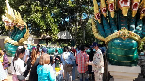 ส่องเลขเงินปากนาค คำชะโนด เสี่ยงโชคหวยปีใหม่ คนตาดีเจองูเขียวช้าง 