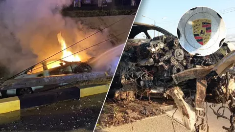 รถหรูปอร์เช่ซิ่งแหกโค้ง ชนเสาไฟฟ้าหักไฟลุกท่วมคัน ยังไร้วี่แววคนขับ (คลิป)