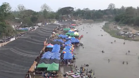 อากาศร้อนคนเชียงใหม่ แห่ไปหาดก๋ำเบ้อ เล่นน้ำปิงลงแพเปียก พาเงินสะพัดในชุมชน