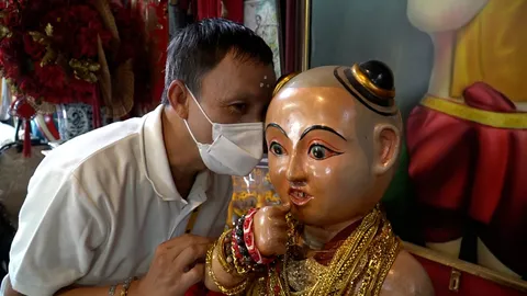 หนุ่มแก้บน "ไอ้ส้มฉุน" หลังถูกหวยครั้งแรกในชีวิต อธิษฐานขอเลขเด็ดหวังรวยอีกรอบ