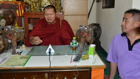 'พระหนาน' ขอความเป็นธรรม ปัดถ่ายคลิปสาวอาบน้ำมนต์ ลั่นไม่หนี