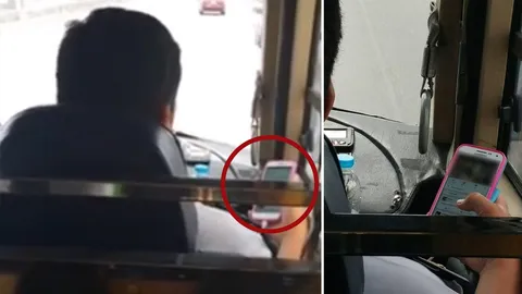 สั่งลงดาบ! คนขับรถทัวร์ "ขับไป เล่นมือถือไป" เอาชีวิตผู้โดยสารเป็นเดิมพัน (ชมคลิป)