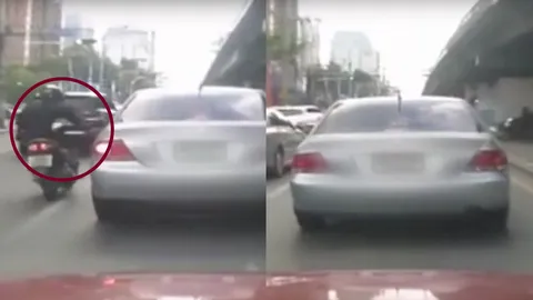 ชาวเน็ตสวดยับ! นักเลงถนนขับจยย.ไล่ถีบรถ สุดท้ายกองกับพื้น