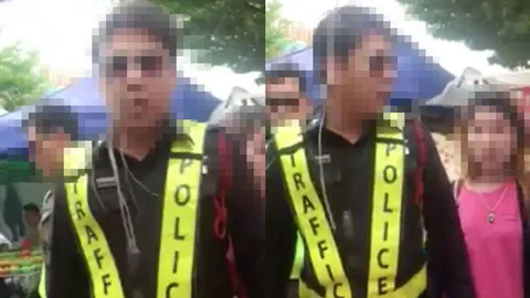 สั่งพักงาน! อาสาจราจรไล่แม่ค้า เหตุขายโดนัทซ้ำกันในตลาด (ชมคลิป)