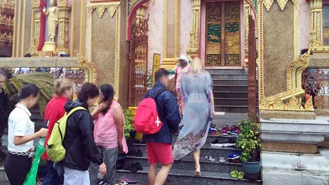 ใจหายวาบ! แหม่มสาวแต่งชุดสุดหวิว สวมซีทรู เดินเด้งในวัดดังภูเก็ต 