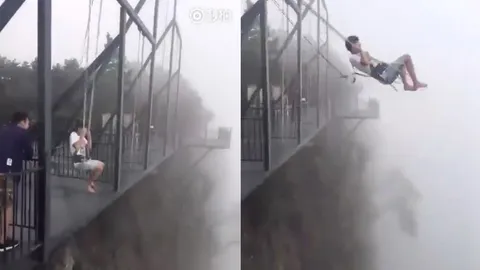 เสียวท้องน้อย! หนุ่มโชว์นั่งชิงช้าแกว่งไปมาบนหน้าผาสูงที่จีน  (ชมคลิป)