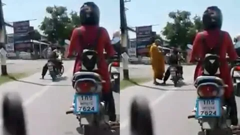 คลิปหนุ่มนักบิดเบิ้ลเครื่องกลางสี่แยก พระเดินมาเตือนไม่ฟัง (ชมคลิป)