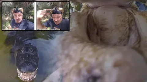 ชมคลิป หนุ่มมะกันสุดเฮงติดกล้องบนหัวถ่ายจระเข้ พลาดโดนงับรอดตายปาฏิหาริย์  