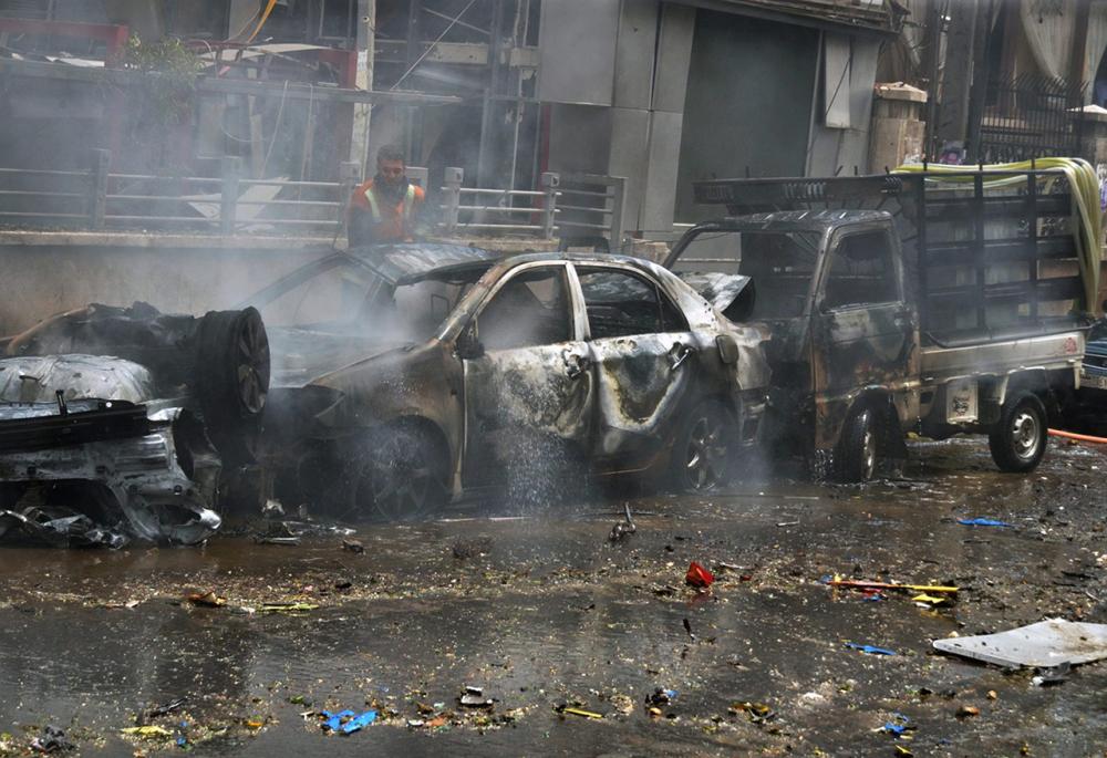 รถยนต์ได้รับความเสียหายจากไฟไหม้ (ภาพ: AP)