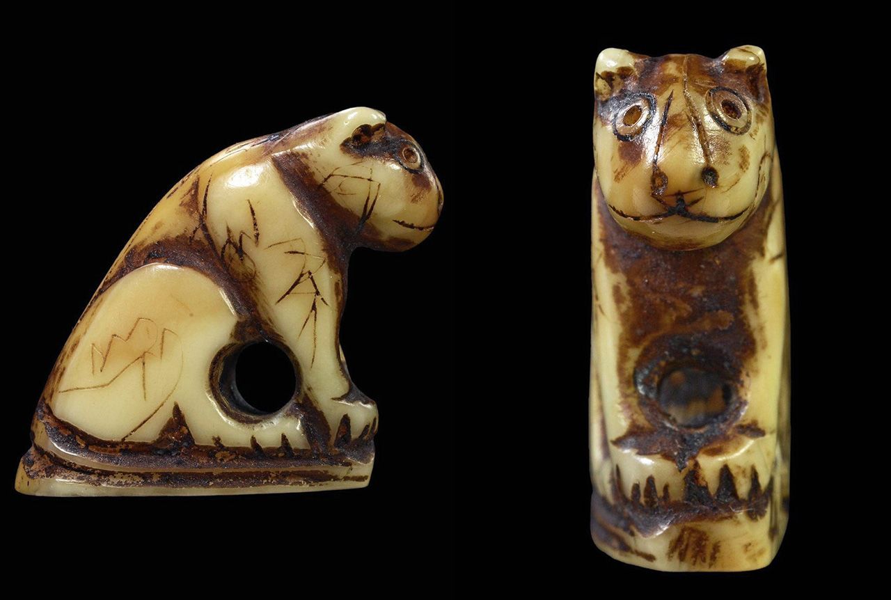 เขี้ยวเสือแกะ หลวงพ่อปาน วัดคลองด่าน ของ สถิต ราชบุรี.