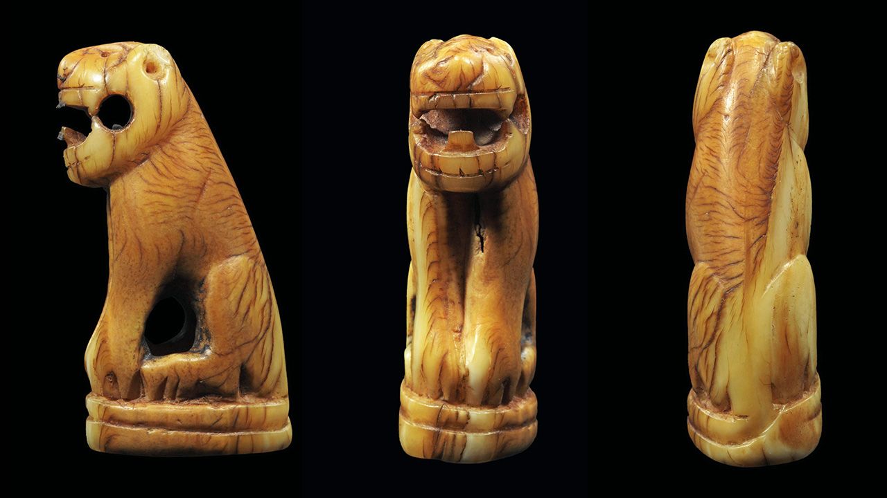 เขี้ยวเสือแกะ หลวงพ่อสาย วัดคลองด่าน ของ ดร.ณัฐธัญ มณีรัตน์.