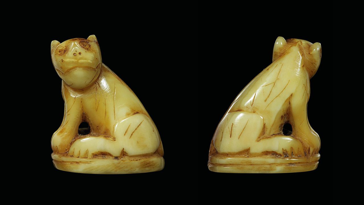 เขี้ยวเสือแกะ เหลียวหลัง หลวงพ่อ ปาน วัดคลองด่าน ของไพโรจน์ ธีระธำรงชัยกุล.