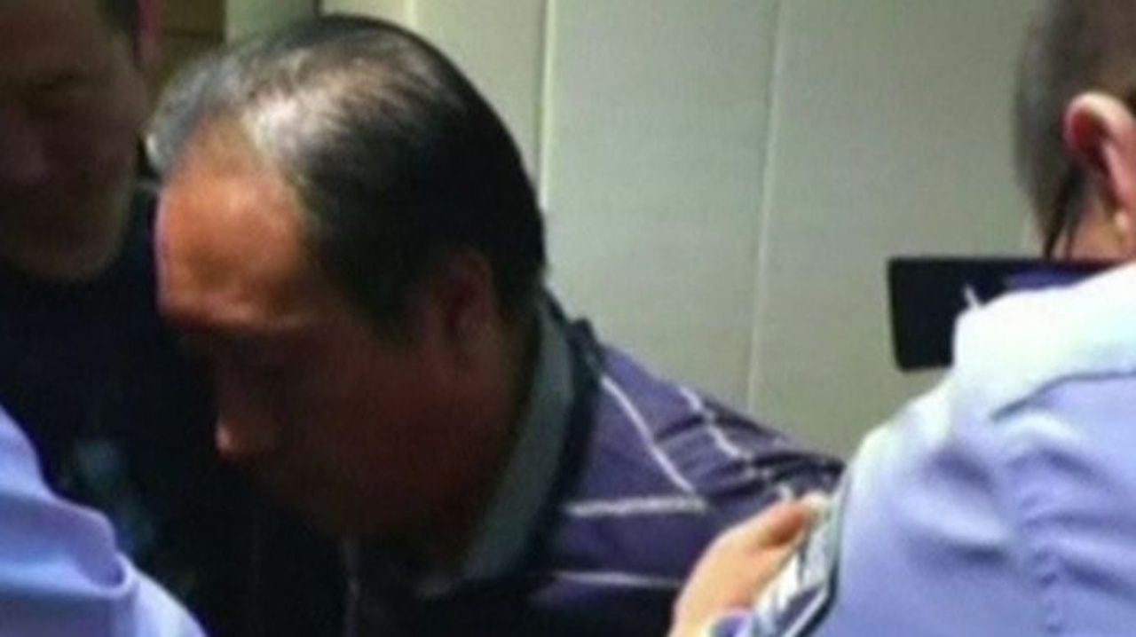 ภาพตอนที่นายเกาถูกจับกุมเมื่อปี 2559