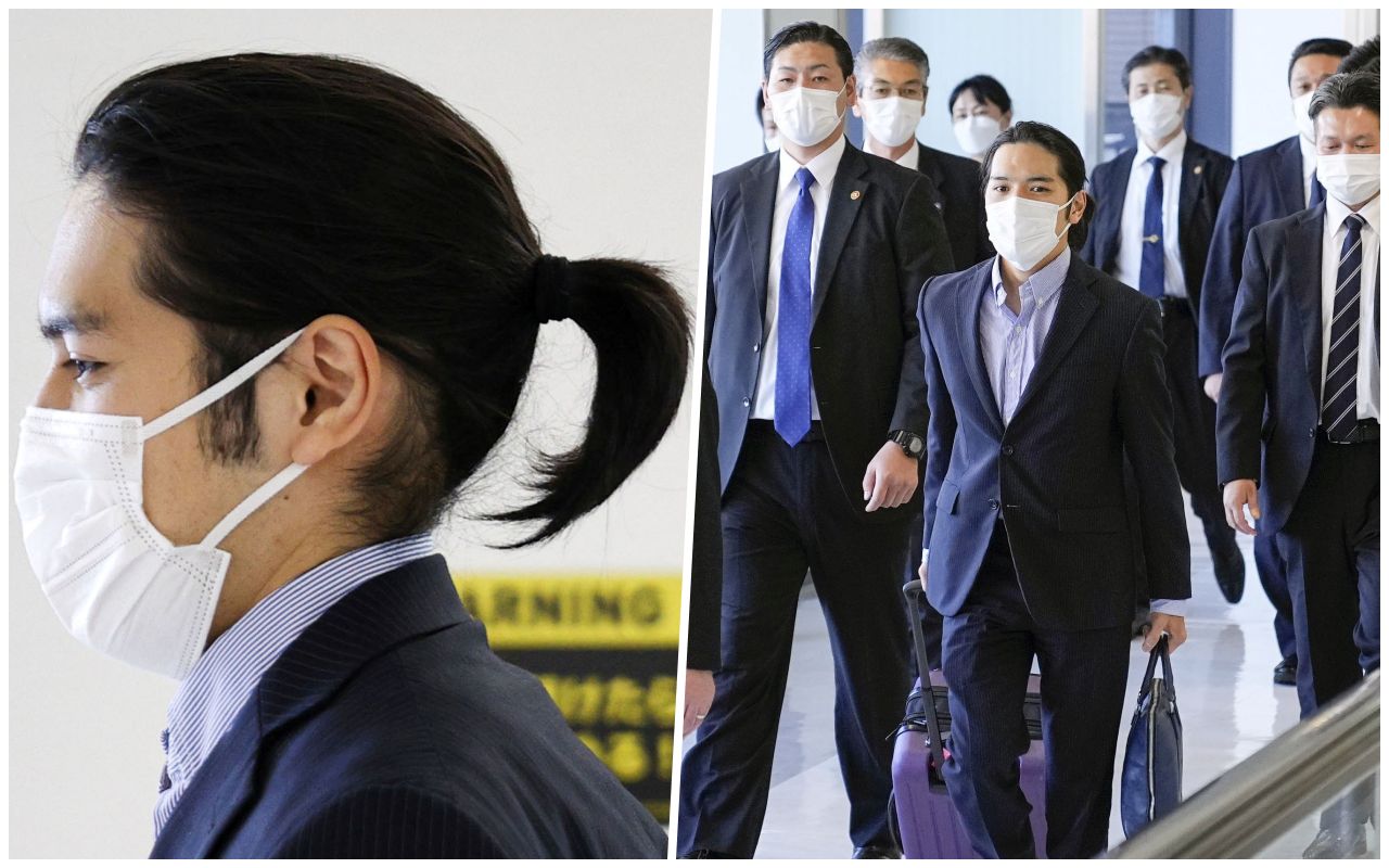 เคอิ โคมุโระ มัดผม ขณะเดินทางจากสหรัฐฯมาถึงสนามบินในญี่ปุ่น เพื่อแต่งงานกับเจ้าหญิงมาโกะ
