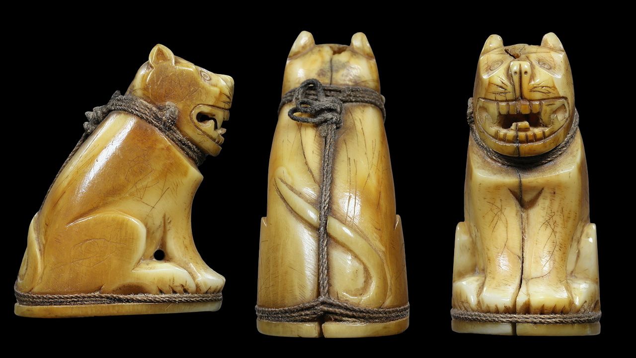 เขี้ยวเสือแกะ หลวงพ่อปาน วัดคลองด่าน ของกำนันมานะ คงวุฒิปัญญา.