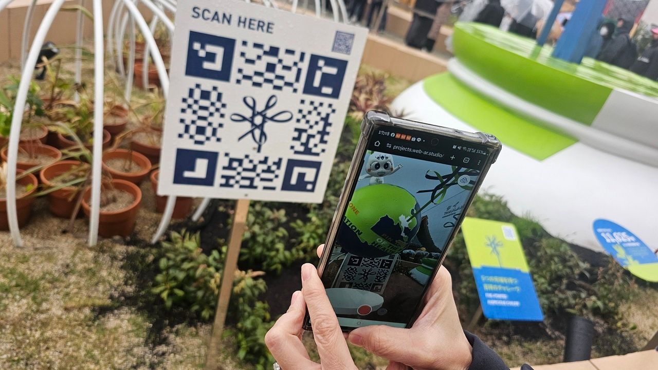 โซน 1 หมุดหมายสุขภาพโลก โดยสแกน QR Code เพื่อเล่น AR ทำการปักหมุดเฉลว ณ อาคารนิทรรศการไทย ให้ทั่วโลกได้รู้จัก