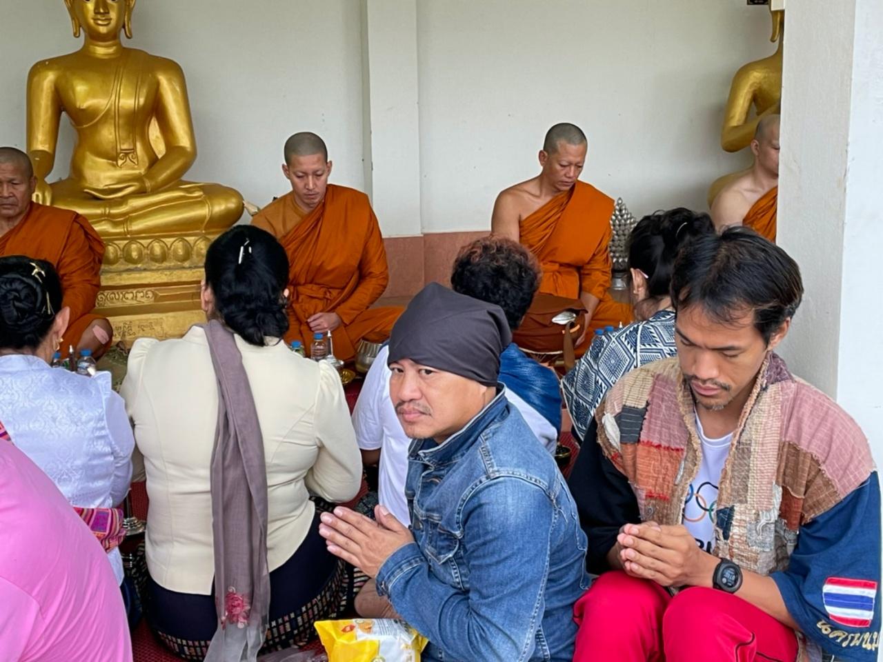 Lao People Sathu Phra Tono went out for alms to please his relatives in Khammouane Province.