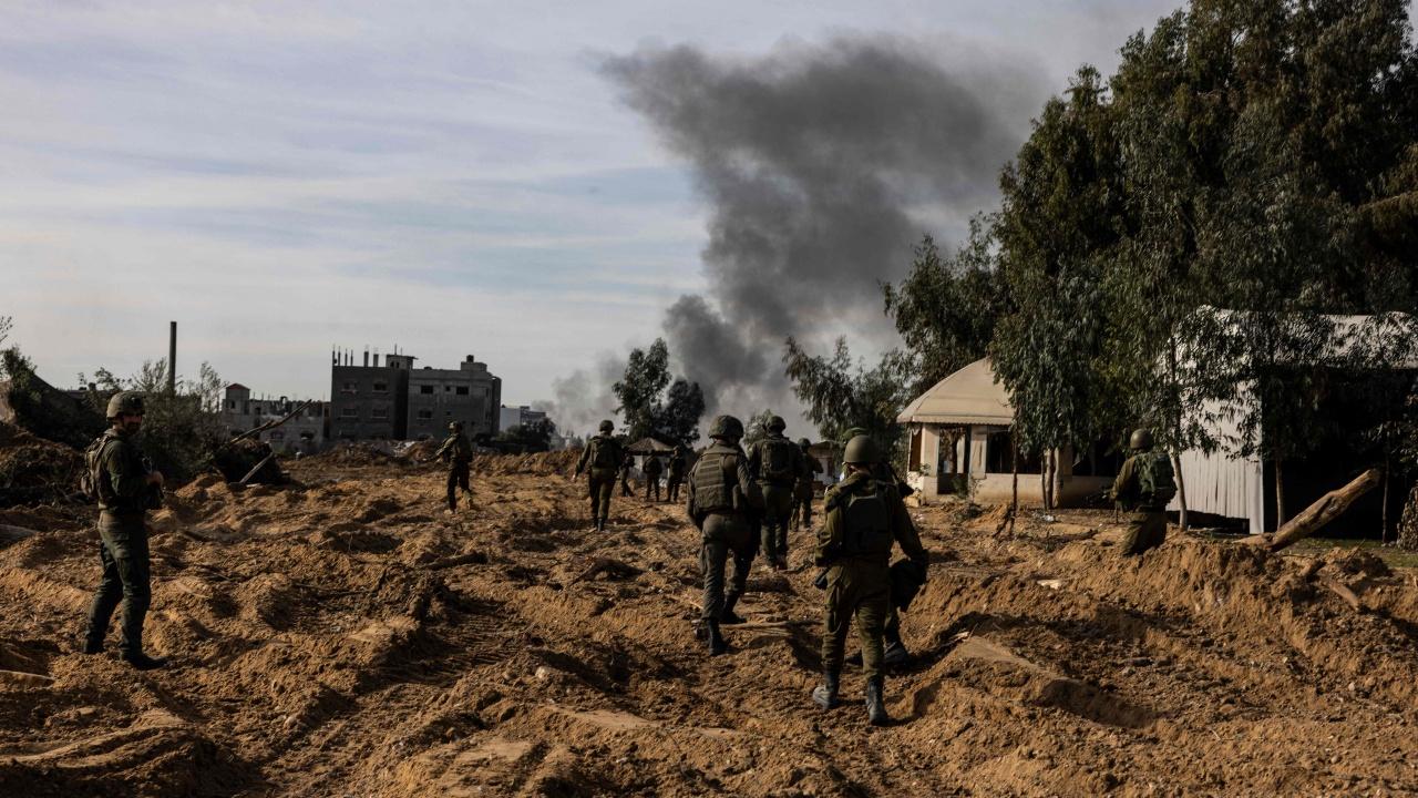 Israeli soldiers conduct ground operations in central Gaza on January 8, 2024. 